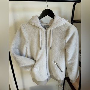 Faux fur hooded jacket.